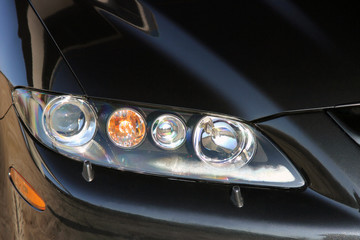 Obraz na płótnie Canvas Car headlights. Luxury Headlights