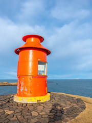 Stykkisholmur lighthouse on hill in Iceland