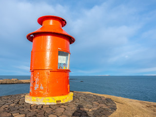 Stykkisholmur lighthouse on hill in Iceland