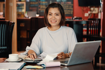 Business lady working with papers