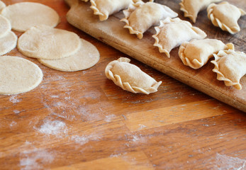 Raw meat pelmeni, ravioli, dumplings