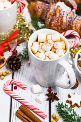 Obraz na płótnie Canvas Christmas and New Year Background with Hot Cocoa with Marshmallows. Selective focus.