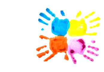 Four colorful child's handprints isolated on white with copyspace. World autism awareness day...