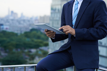 Businessman with digital tablet