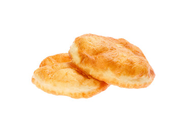 Traditional Bulgarian homemade donut like breakfast, named Mekitsa or Mekica, isolated on white background. Mekitsa is made of kneaded dough that is deep fried