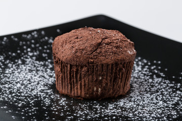 Freshly baked chocolate muffin or cupcake