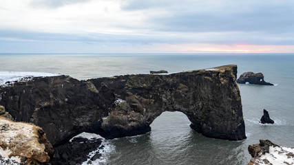 Dyrhólaey arch view on Iceland in winter