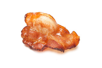 Fried bacon rashers isolated on white background.