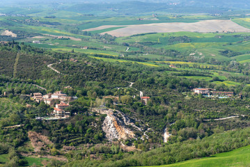 Fototapeta premium Amazing aerial view of Bagno Vignoni from Fortress of Tentennano, Tuscany, Italy