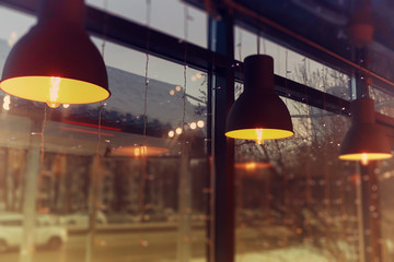 beautiful lamps with yellow incandescent lamps as part of the decor and interior of the room