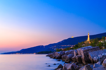 Sunset near the old  lighthouse of Trieste - obrazy, fototapety, plakaty