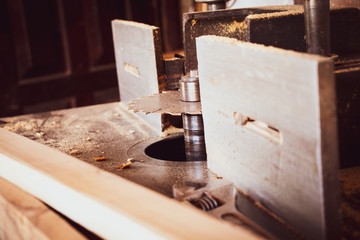 circular saw with carpenter store blur background closeup