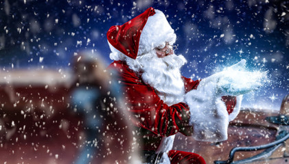 Red old Santa Claus and magic night with snowflakes 
