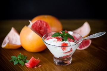 sweet homemade organic yogurt with slices of red grapefruit