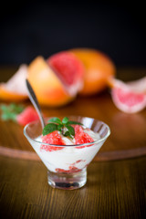 sweet homemade organic yogurt with slices of red grapefruit