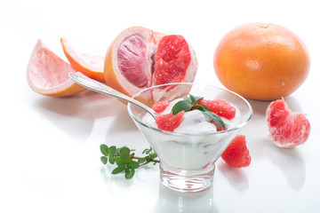 sweet homemade organic yogurt with slices of red grapefruit