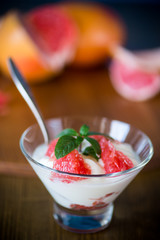 sweet homemade organic yogurt with slices of red grapefruit