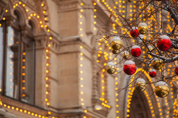 cozy streets of the big city, decorated with light bulbs and decorations for the new year