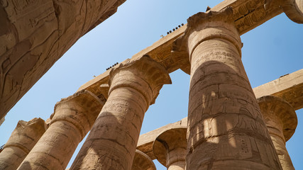 Karnak Temple in Luxor, Egypt. The Karnak Temple Complex, commonly known as Karnak, comprises a...
