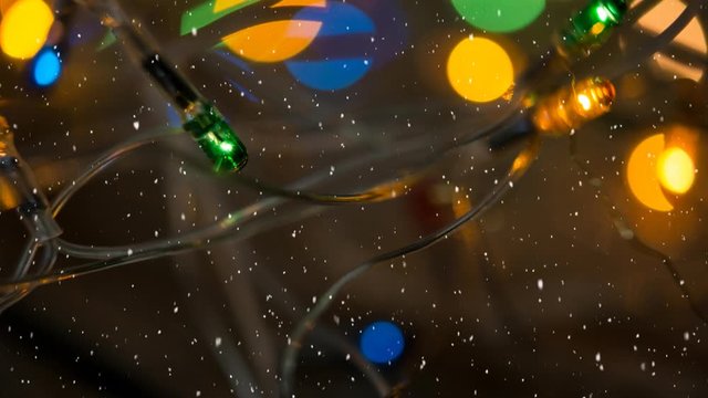 Falling snow with Christmas lights
