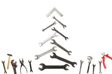 christmas tree figure made of old rusty wrench isolated on white