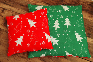 Christmas background with red and green pillows