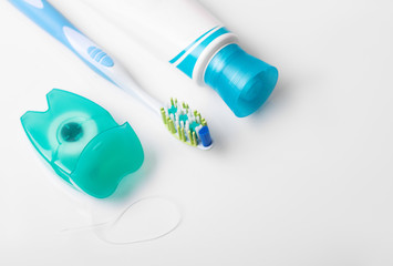 Tools for dental care: orthodontic brush, floss, toothpaste. Invisible dental aligners modern tooth...