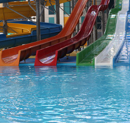 Water park. Blue pool slide swimming. Aquapark.