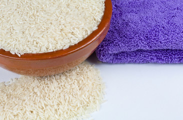 Bowl of rice and kitchen towel detail