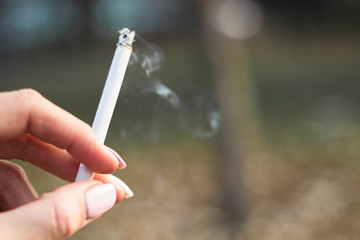 Young woman enjoying a cigarette