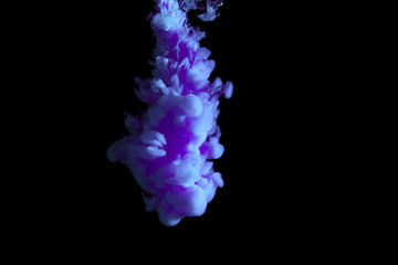 paint stream in water, colored ink cloud, abstract background, process of liquefaction blue dye on...