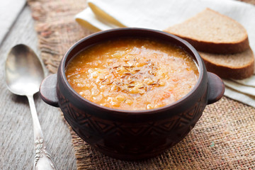 Kapustnyak - traditional ukrainian winter soup with sauerkraut, millet and meat