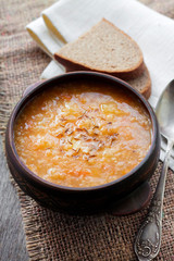 Kapustnyak - traditional ukrainian winter soup with sauerkraut, millet and meat