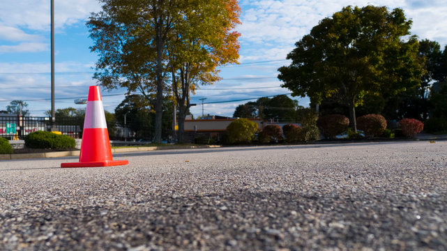 Orange Construction Cone In A Parking Lot