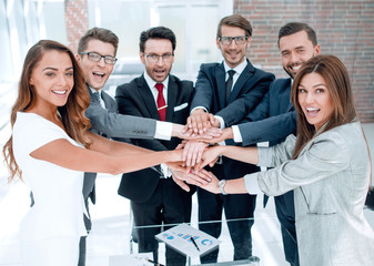 happy business team standing in office