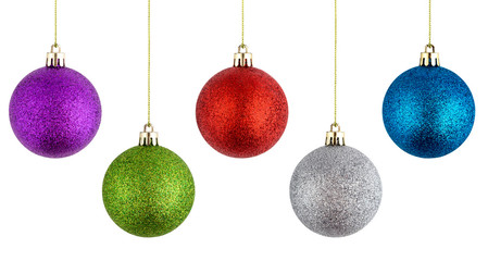 Christmas balls hanging on a white background. Several christmas balls isolated on white background.