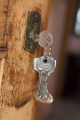 lock with keys in the old or retro door, vintage
