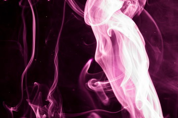 Purple smoke on black background
