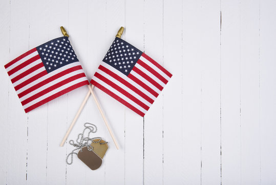 Military Dog Tags and American Flags And Copy Space