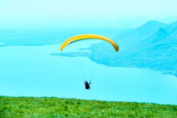 Paragliding over lake Garda in Italy