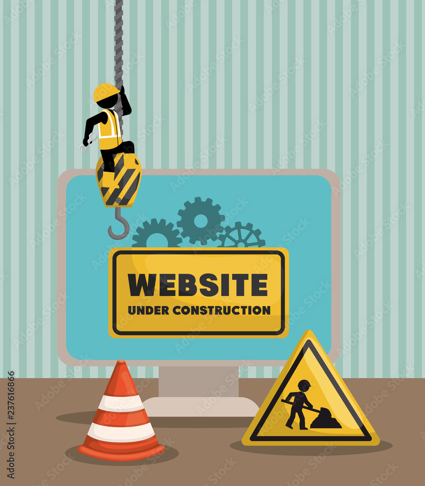 Poster website under construction with desktop computer