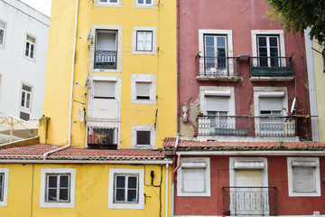 Naklejka premium colorful houses in old town of Lisbon, Portugal