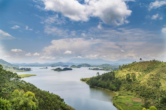Lake Mutanda, east bank, behind Virunga Mountains, Uganda, Africa