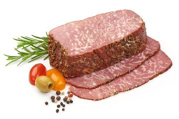 Jerked Marbled meat Black Angus Steak Ribeye with herbs, spices and tomatoes, isolated on a white background. Close-up