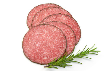 Italian Semi-dry Sliced Sausage with herbs, isolated on a white background. Top view