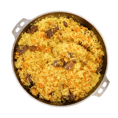 Top view of pilaf in a large pan isolated on white. Eastern cuisine