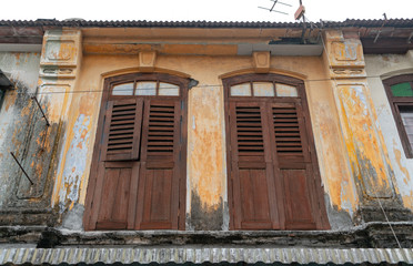The wooden shutters and doorways of the beautiful architecture of colonial George Town in Penang Malaysia