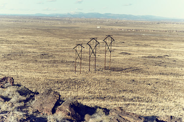 Pylons and rock on mesa