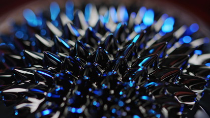 The natural phenomenon of magnetism ferrofluidic substances under the action of a neodymium magnet...