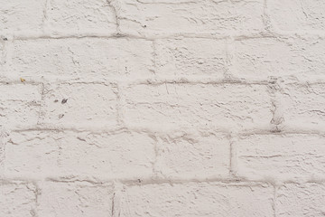 blurred white brick wall